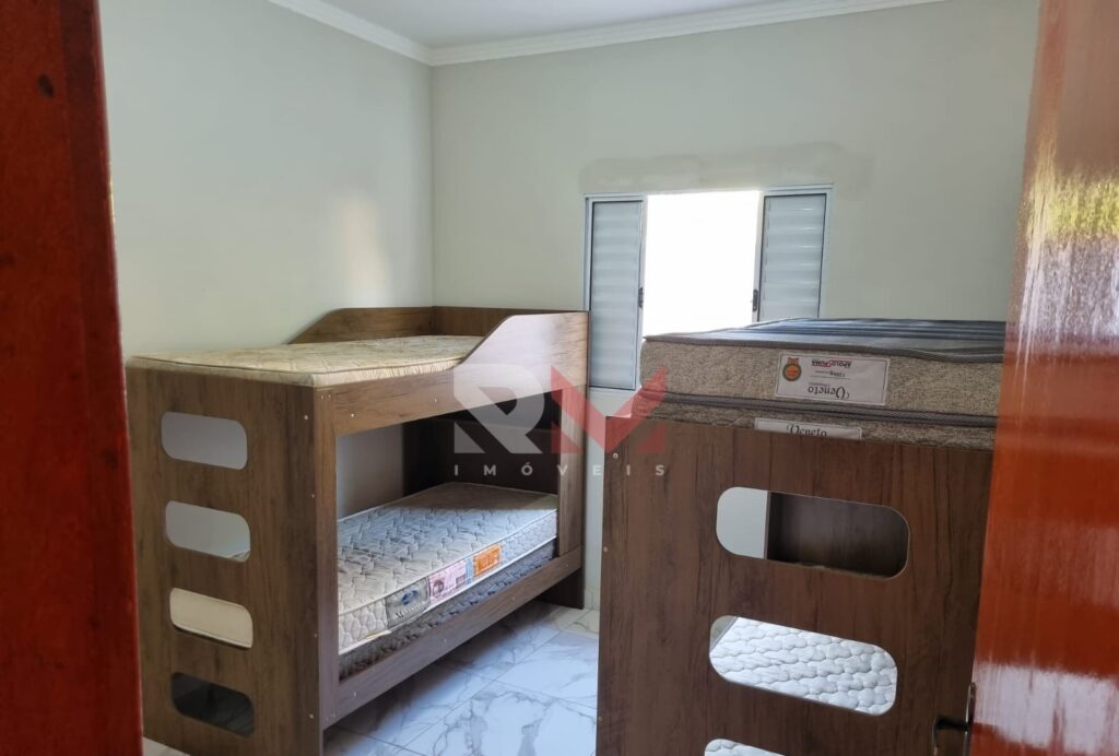 Casa nova com piscina e porteira fechada no bairro Campos Elíseos em Itanhaém/SP.