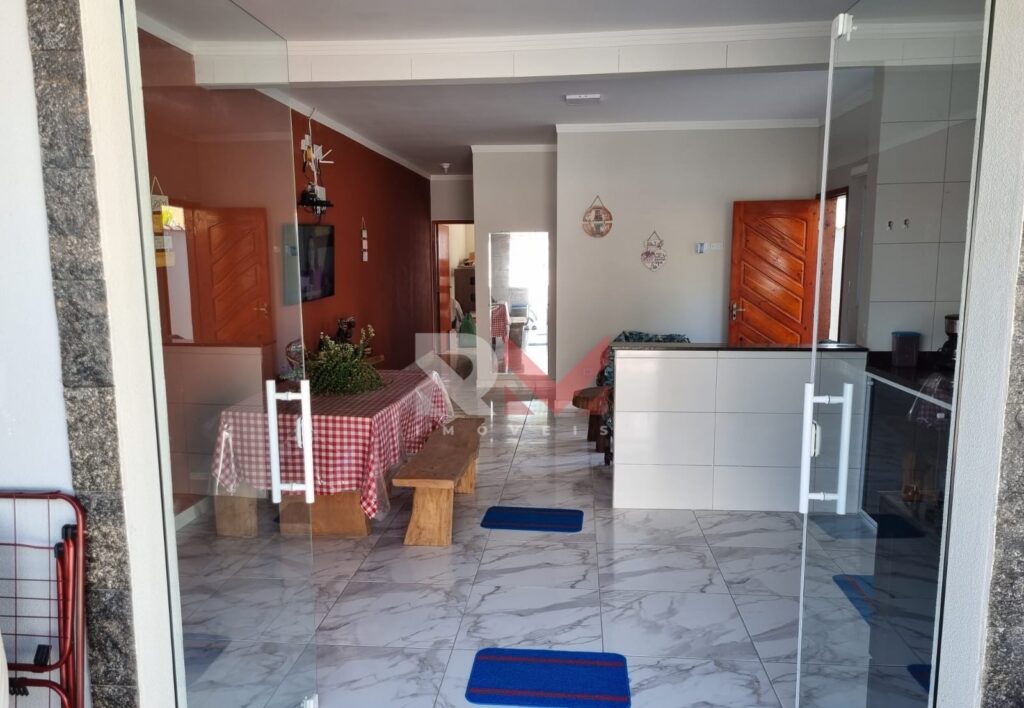 Casa nova com piscina e porteira fechada no bairro Campos Elíseos em Itanhaém/SP.