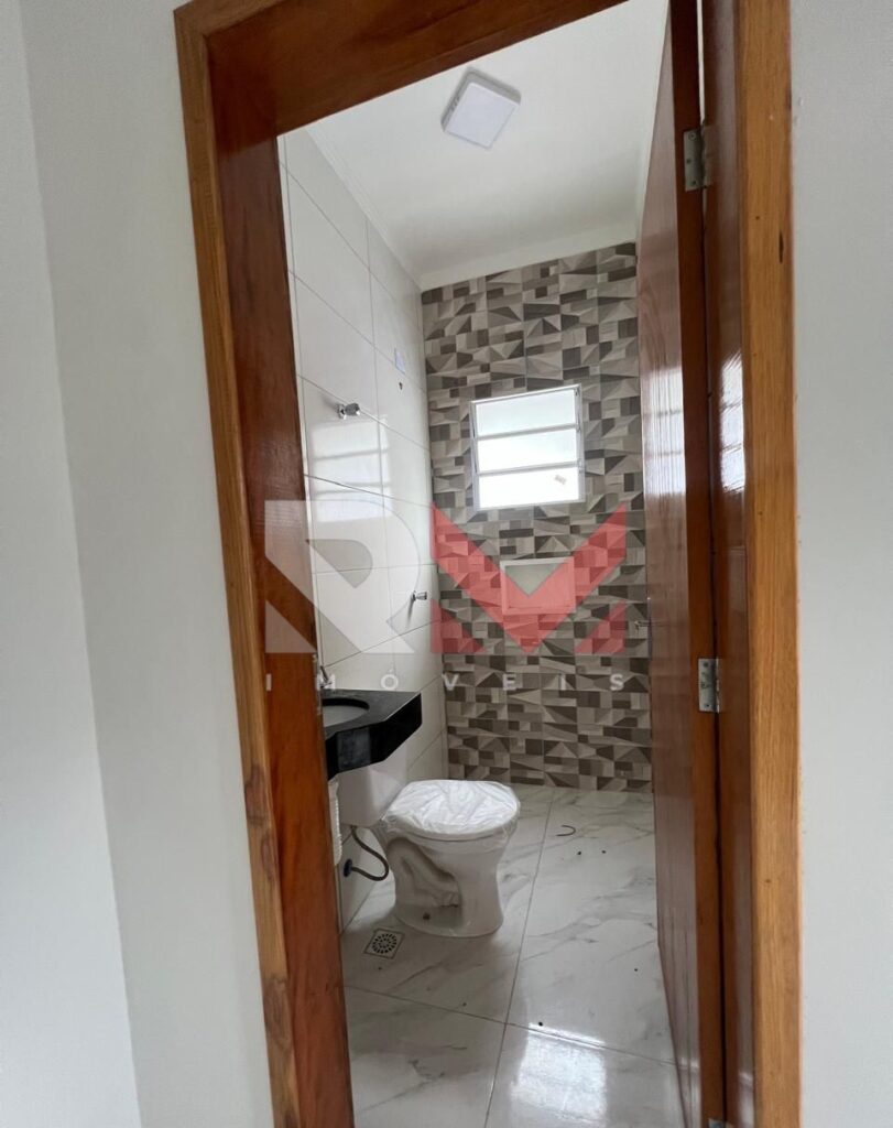 Casa com piscina localizada no bairro Jardim Comendador em Itanhaém/Sp