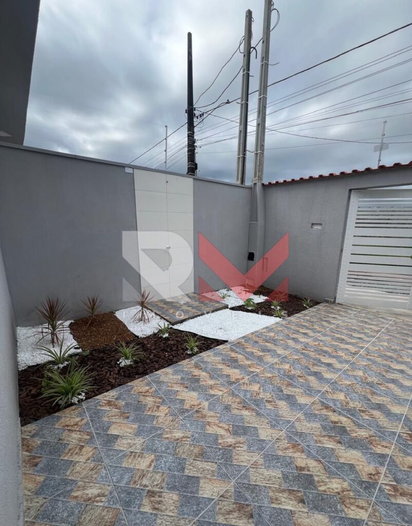 Casa com piscina localizada no bairro Jardim Comendador em Itanhaém/Sp