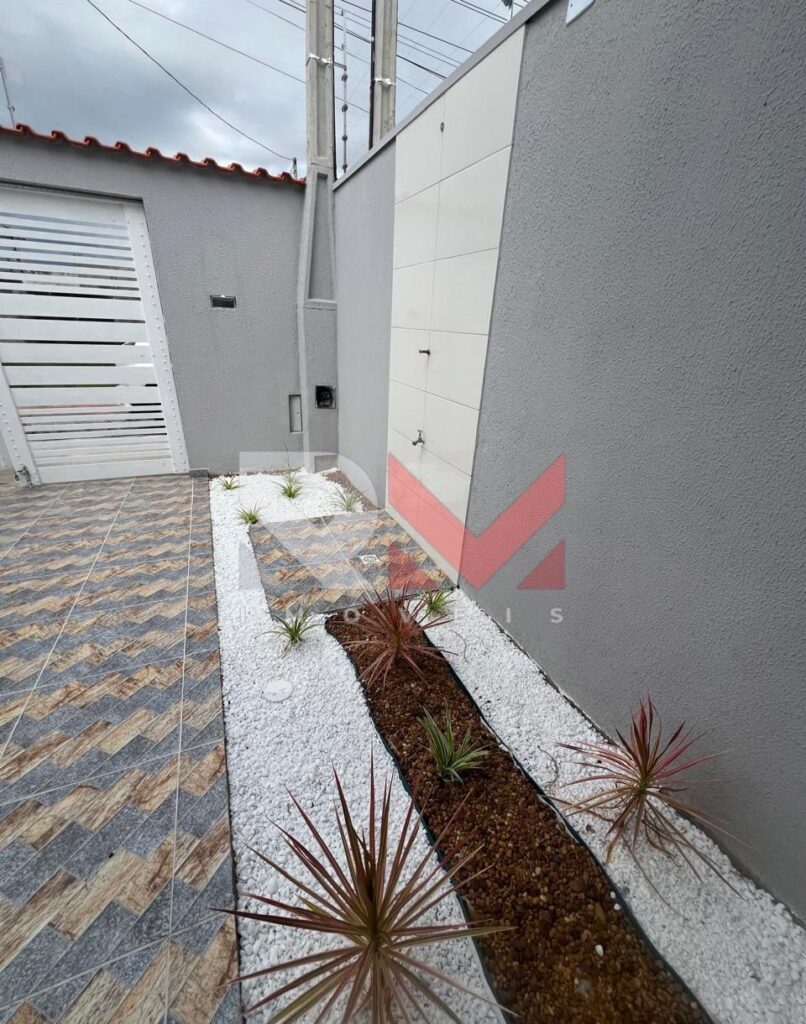 Casa com piscina localizada no bairro Jardim Comendador em Itanhaém/Sp