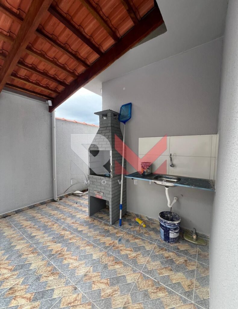 Casa com piscina localizada no bairro Jardim Comendador em Itanhaém/Sp