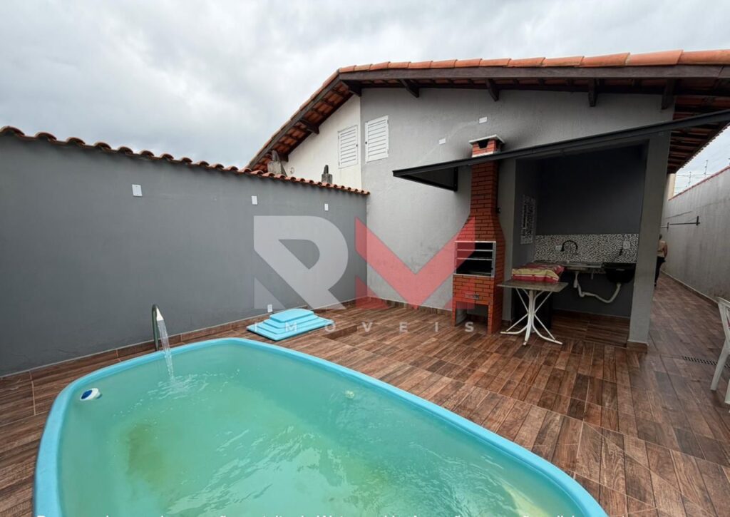 Casa com piscina localizada no bairro Gaivota em Itanhaém/Sp