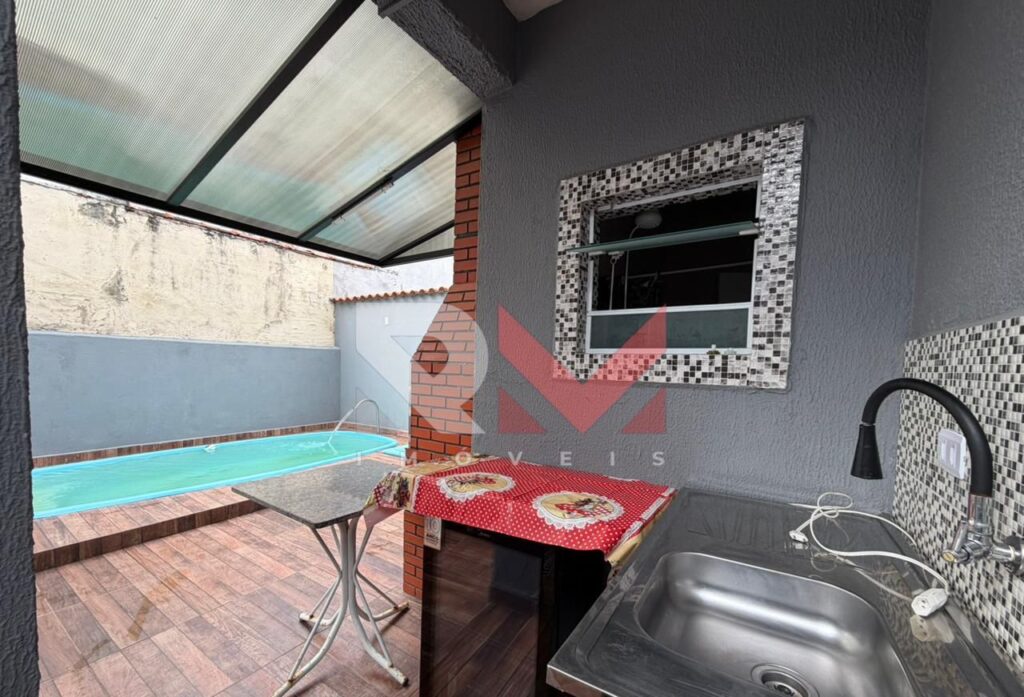 Casa com piscina localizada no bairro Gaivota em Itanhaém/Sp