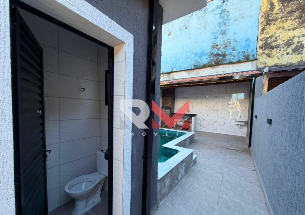 Casa com piscina localizada no bairro Savoy em Itanhaém/Sp