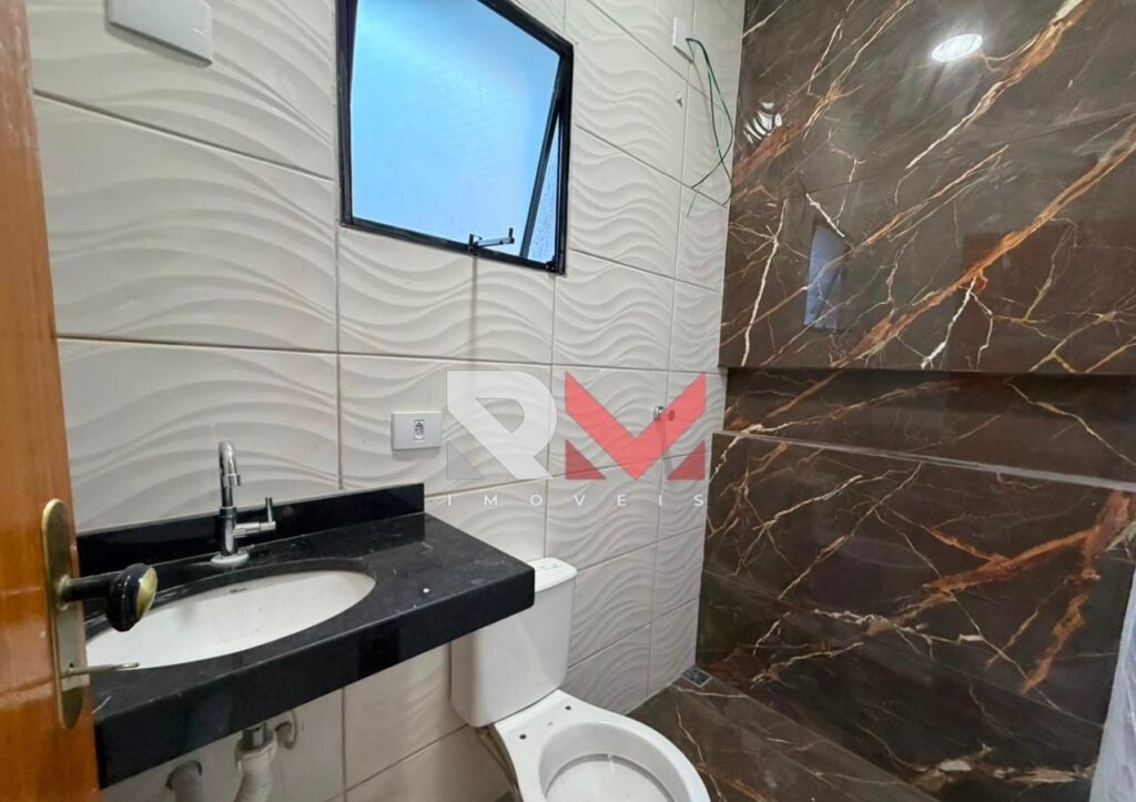 Casa com piscina localizada no bairro Savoy em Itanhaém/Sp